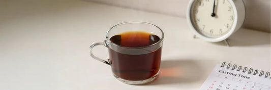 Plain black cup of black tea representing fasting-safe beverages